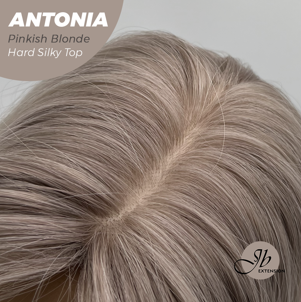 JBEXTENSION 28 Inches Scalpiana Long Curly Pinkish Blonde 3.5X4 Hard Silky Top Natural Scalp Effect Wig ANTONIA PINKISH BLONDE